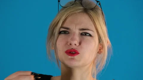 Dissatisfied model speaks in front of camera Stock Footage 306488660