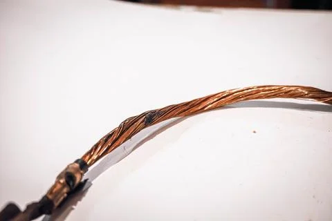 Dissected Broken Battery Ground Cable or Strap of Volkswagen Tiguan 2014 Stock Photos