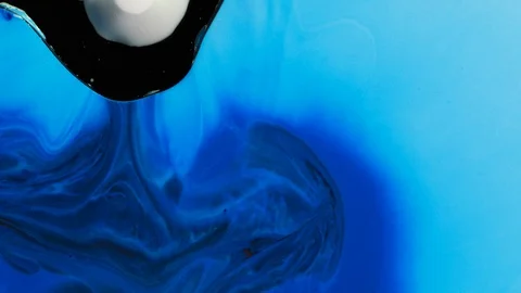 Dissolve ink in water Stock Footage 85911391