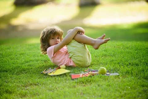Distance children learning. Funny elementary school boy. Stock Photos