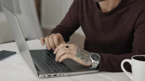 Distance education concept, freelancer, work from home, hands with tatoo Stock Footage 142571379