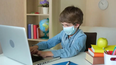 Distance education online lesson learning concept. Child Boy Kid schoolboy in Stock Footage 132746903