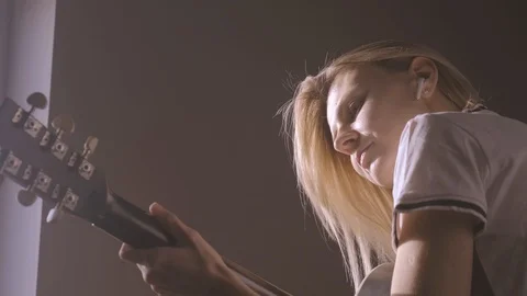 Distance learning guitar Stock Footage 127042910