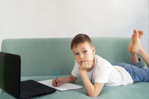 Distance learning at home with students . students study at home Stock Photos