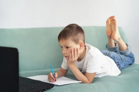 Distance learning at home with students . students study at home. Stock Photos