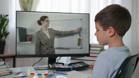 Distance learning, male child study at home with help of modern technologies Stock Footage 128455689