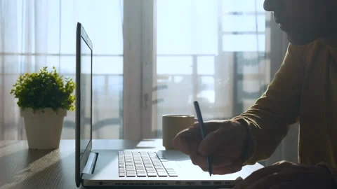 Distance learning, online lesson. Focused smart adult male student studying Stock Footage 255832567