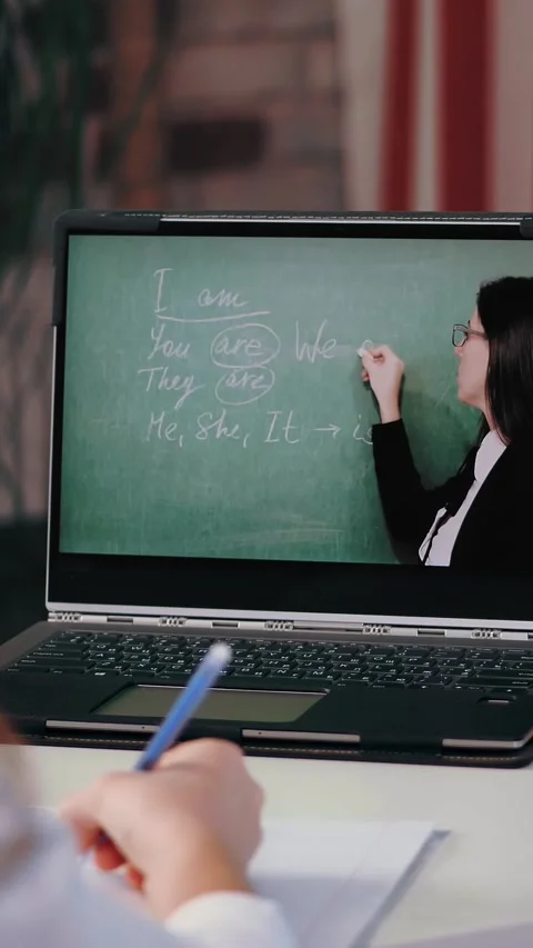 Distance learning, online schooling. close-up of laptop screen. schoolgirl Stock Footage 315759510