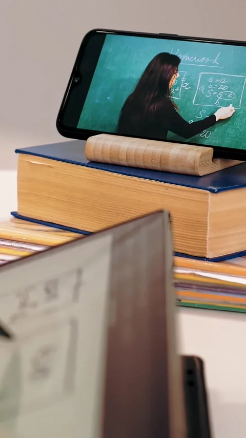 Distance learning, online schooling. close-up of smartphone screen. schoolgirl Stock Footage 317850175