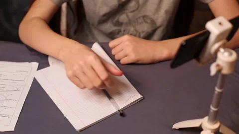 Distance learning with phone Video stock 163550635