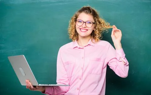 Distance learning. School teacher notebook. Girl surfing internet. School of Stock Photos