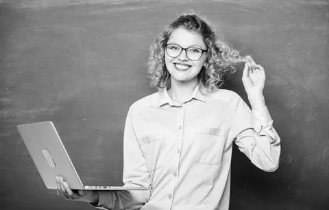 Distance learning. School teacher notebook. Girl surfing internet. School of Stock Photos