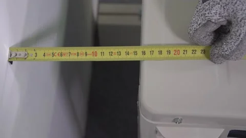 Distance measurement between wall and external machine Stock Footage 148734492