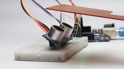 Distance measurement sensor or the ultrasonic sensor is activating the LED Stock Footage 339018342