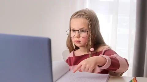 Distance remote education online learning lesson at home writing Stock Footage 148528576