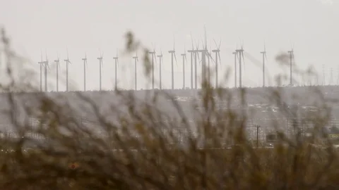 The distance video of operating windmills Stock Footage 77059603