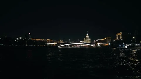 In the distance, a well-lit bridge is visible Stock Footage 318964800