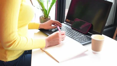 Distance work, woman taping computer at cafe. Freelance .Business people Stock Footage 240036853