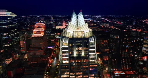 Distancing from the beautiful Chase Tower with luminous neon top. Stunning Stock Footage 325079451