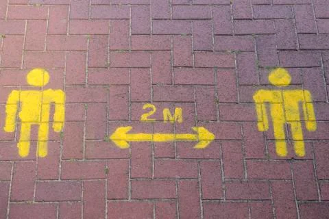 Distancing sign on path 库存照片