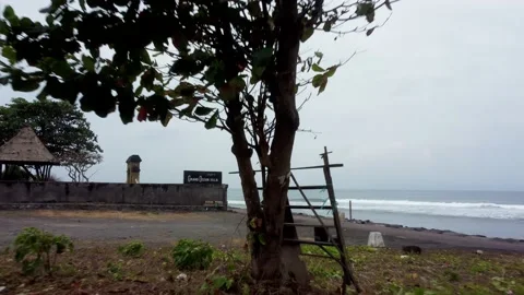 Distancing from two hindu monuments on the beach Stock Footage 154542648
