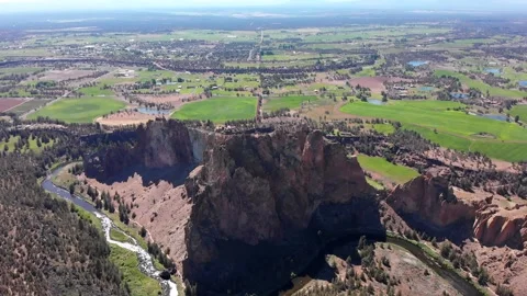 DISTANT AERIAL OF SMITH ROCK IN SMITH ROCK STATE PARK CENTRAL OREGON Stock Footage 151043451