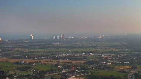 Distant Aerial View of Cha Am Coastal Skyline with High seaview buildings and Stock Footage 314883214