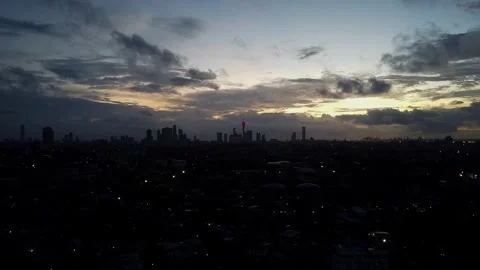 Distant Aerial View of Colombo Skyline at Dusk – Golden Light Stock Footage 306743736