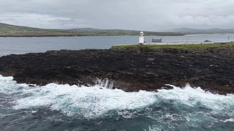 Distant aerial view of the historic white lighthouse station, Ballyglass. Stock Footage 342733540