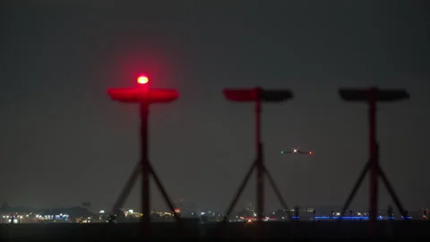 Distant Airplane Takes off at Night Video stock 332461887