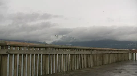 Distant Assending Small Seaplane Viewed From Wooden Wharf Stock Footage 16286602