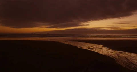 The distant beam of Cape Blanco Lighthouse guards the Oregon Coast 動画素材 127587890