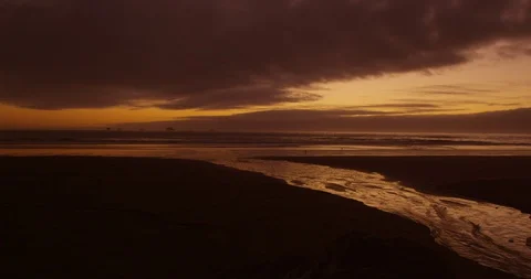 The distant beam of Cape Blanco Lighthouse guards the Oregon Coast Stock Footage 127593911