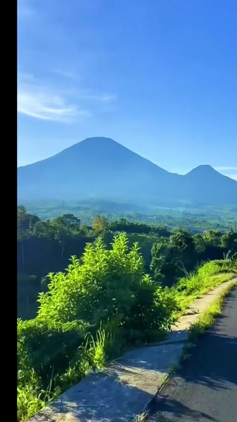 Distant Blue Mountain in the Morning Light Stock Footage 310073365