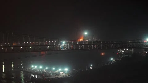 Distant Bridge Lights Over Water at Night Stock Footage 334235762