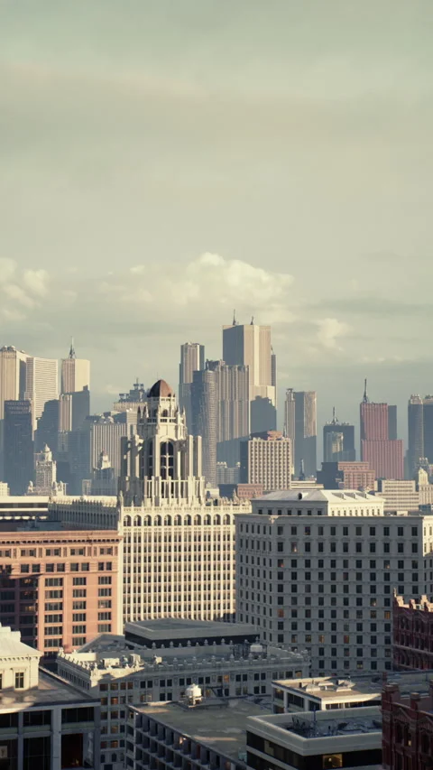 Distant clouds over city skyline during golden hour illuminating buildings Stock Footage 348807884