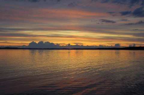 Distant colorful sunset Stock Photos