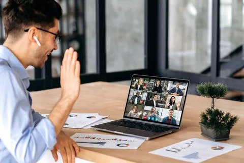 Distant communication. Caucasian man having virtual business meeting, talking Stock Photos
