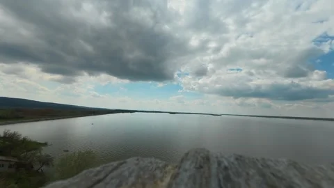 Distant Danube river stretches under dramatic. Timelapse. Ram Fortress, Serbia Vidéo 332543218