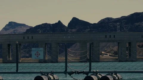 A distant desert river dam Stock Footage 241498468