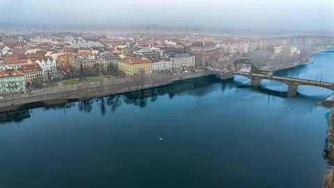 Distant Drone View of Prague City, River and Bridge Stock-Fotos