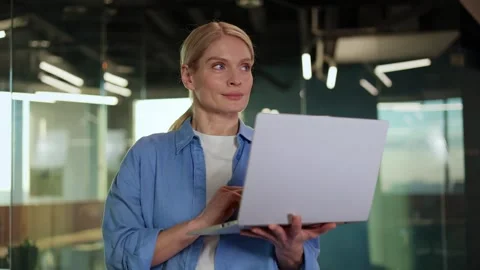 Distant female worker using portable computer for answering business emails Stock Footage 265057716