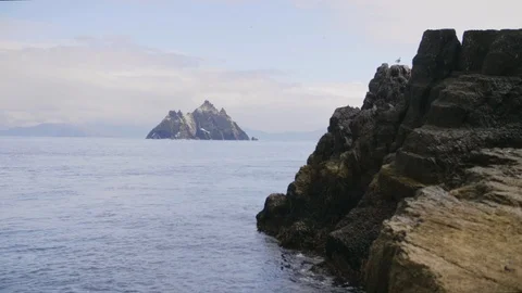 Distant Footage Of Skellig Michael Island Amidst Atlantic Ocean Stock Footage 86067182
