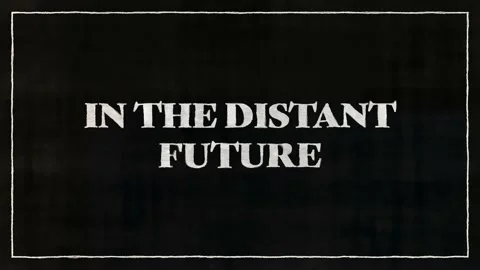 IN THE DISTANT FUTURE White Font On Black Paper Stock Footage 229997107