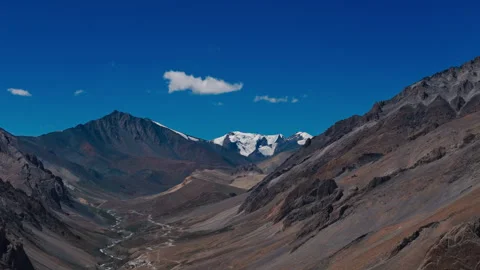 Distant Glacier Among Rugged Ridges Drone View Stock Footage 311351335