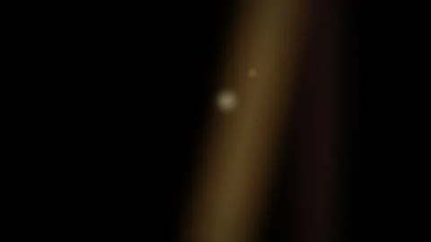A distant glowing point of light captured within the vast darkness of space Video stock 335117412