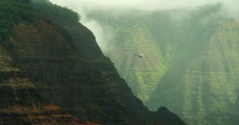 Distant Helicopter Flying over Tropical Scenery - Kauai, Hawaii Stock Footage 59872597
