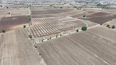 Distant high-angle aerial view capturing a major clean energy development Stock Footage 339912407