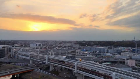 Distant Highway Junction | Sunset Horizon - 4K Aerial Video Stock Footage 333195697