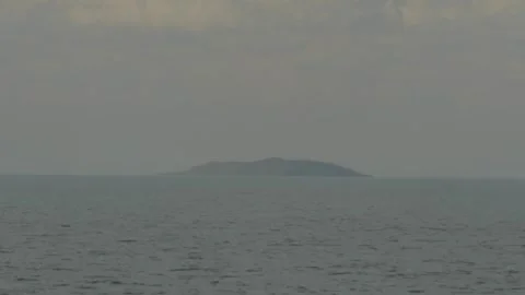 Distant Island on Horizon Stock Footage 342035279
